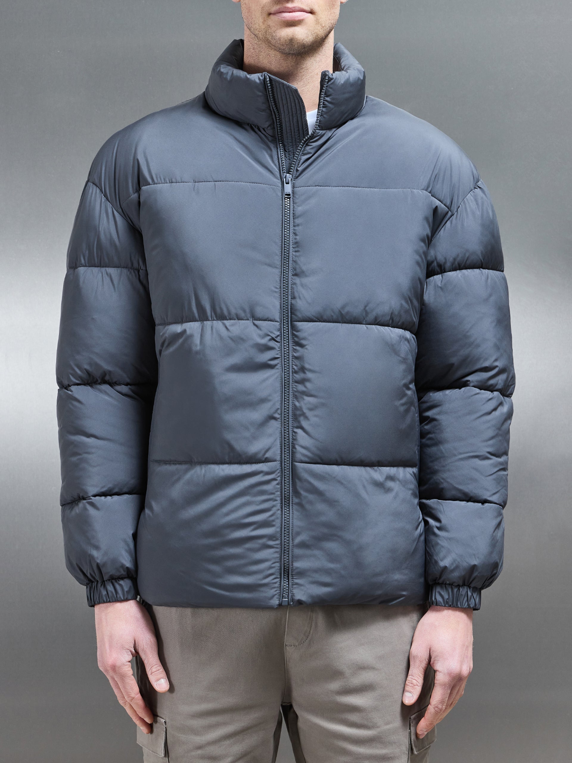 Relaxed Funnel Neck Puffer Jacket in Grey by Xtralitty — Apparel premium streetwear